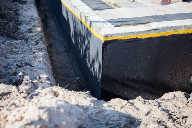 Professional Waterproofing technician working in Jacksonville, AL